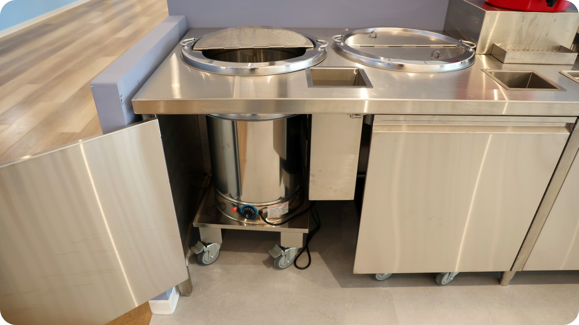 Custom drop-in trolley servery, no lifting required to restock